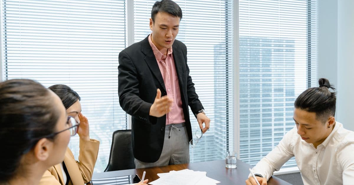A leadership team collaborating in a meeting